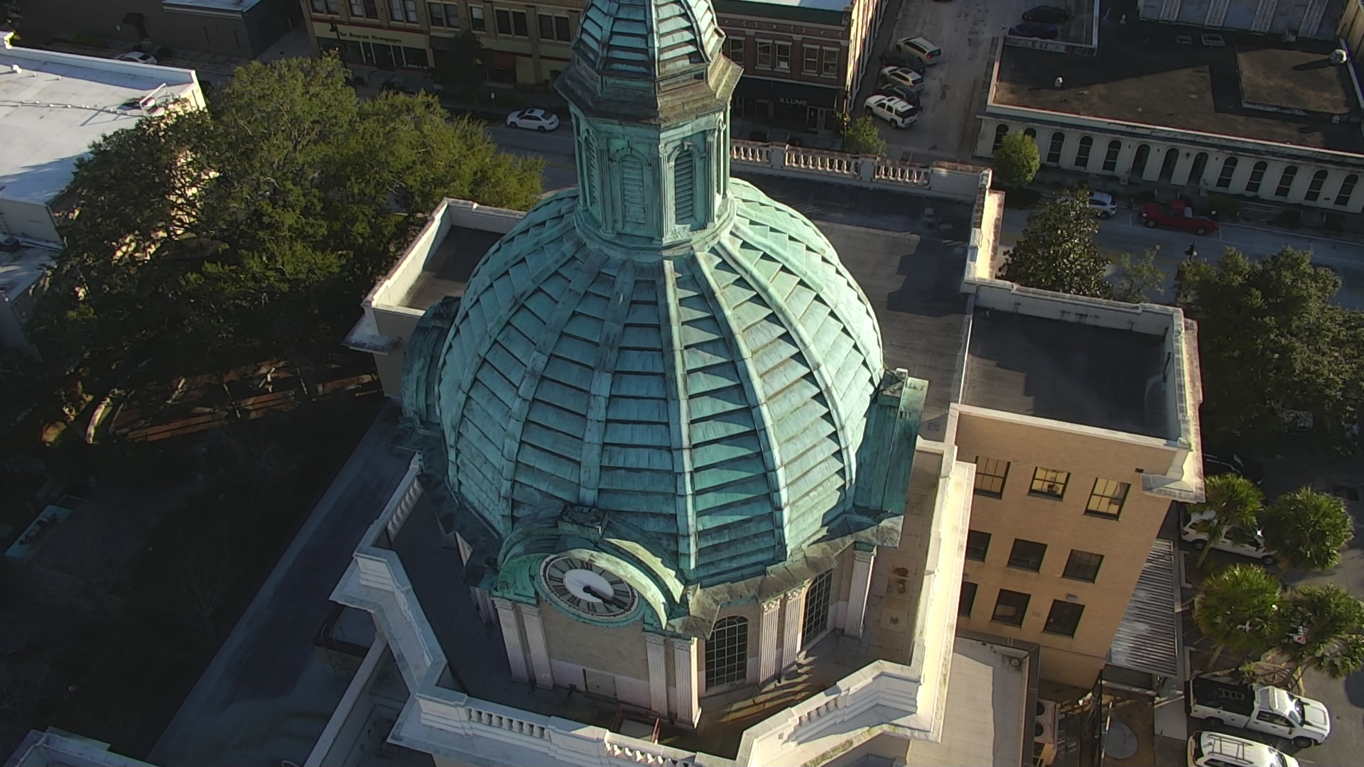 Aerial drone photograph of historic courthouse with copper dome